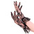 Wrist length lace gloves with ruffled cuffs