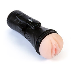 Vibrating pussy in a plastic case