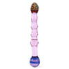 Double-ended pyrex glass toy with colorful swirled tips Double-ended pyrex glass toy with colorful swirled tips