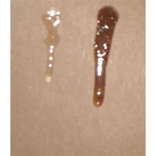 Erotic Massage oil on right (the darker color) and Aphrodisiac Oil on left (lighter color)